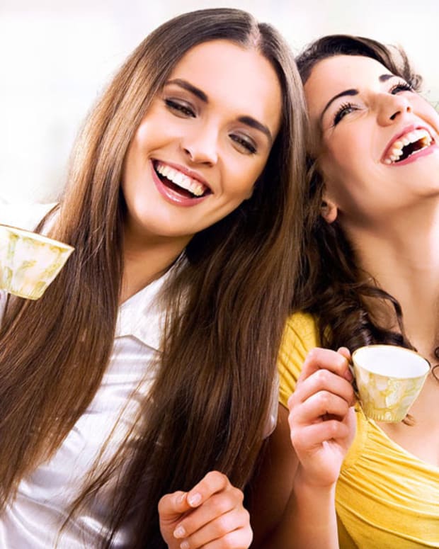 bigstock_Two_smiling_girls_have_coffee__12123947