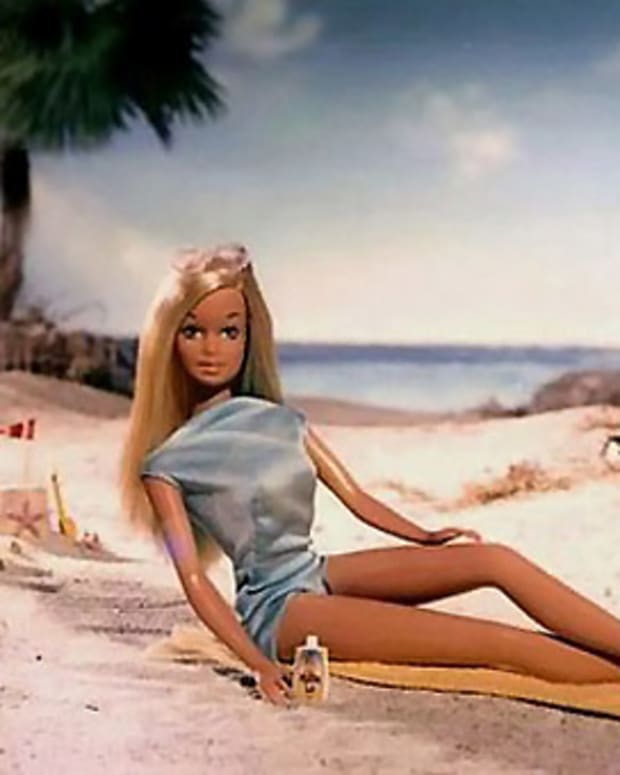 tanned barbie on the beach
