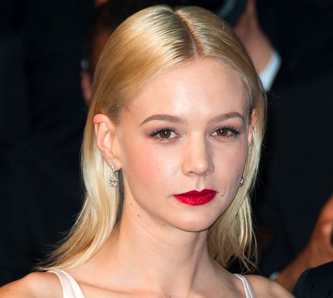 Carey Mulligan as a blonde: her pale hair makes her brown eyes look quite dark. Hair-colour legend Christophe Robin (he works with Catherine Deneuve and a host of other A-listers) says light hair with dark eyes can emphasize dark circles and under-eye wrinkles.