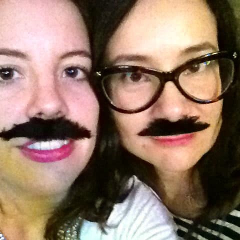 Moustache removal: Elle Canada beauty editor Katherine Flemming and Fashion Magazine beauty director Lesa Hannah can just lift their stick-on 'staches off.