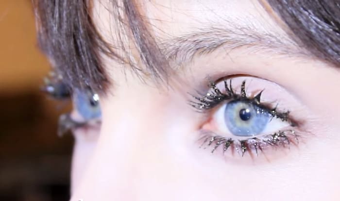 Marc Jacobs Beauty Velvet Noir, Feather Noir and Lamé Noir mascaras, layered. Makeup: Gilbert Soliz.