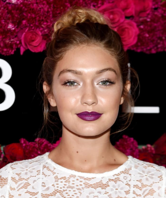 Gigi Hadid wears Maybelline Color Jolt Intense Lip Paint in Violet Rebel