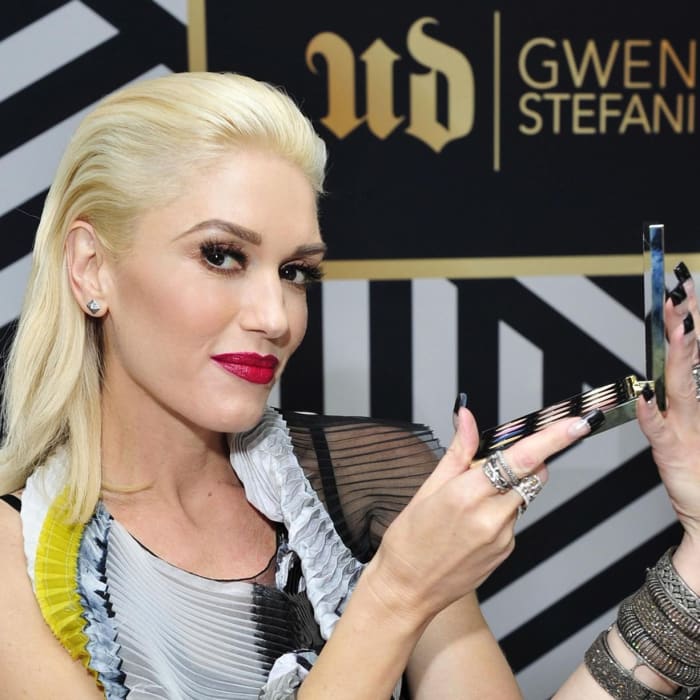 Gwen Stefani signature red lips and bold liner