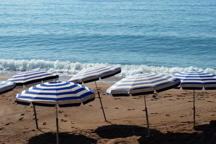 summer fragrances_beach umbrellas south of france by liza herz