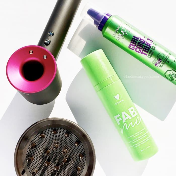 Some frizz-freedom fighters in my arsenal. Not shown: jojoba oil – I mix a little bit with the leave-in.