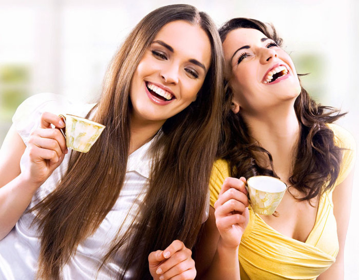 bigstock_Two_smiling_girls_have_coffee__12123947