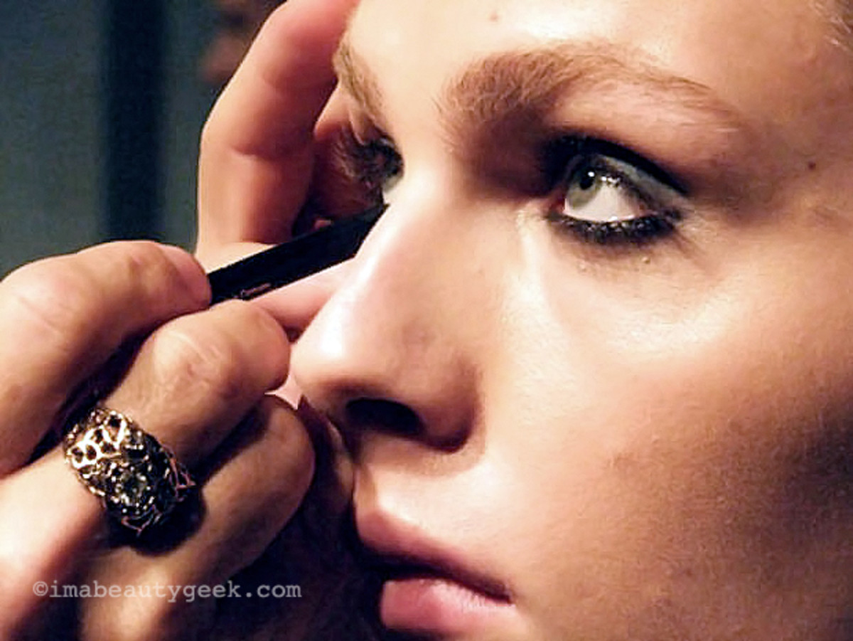 Andrej Pejic in the makeup chair backstage at LG Fashion Week 2012_Andreja
