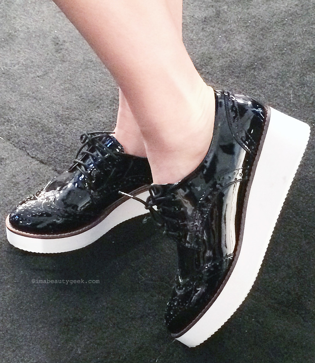 Aldo Taborri lace-up patent brogues with a flatform rubber sole, worn by Essie's Rita Remark at TFW.