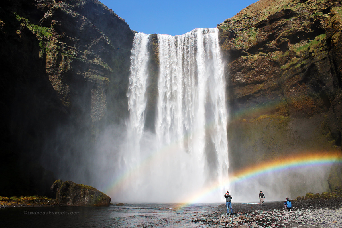 Skogarfoss falls and rainbows on the southern coast of Iceland. Reykjavik Excursions