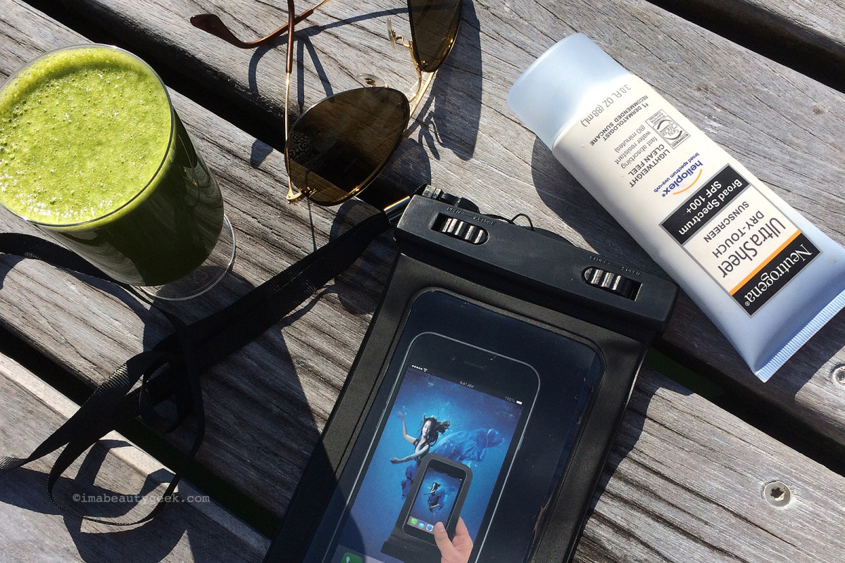 Blue Lagoon: Green smoothie, waterproof cel phone case, Neutrogena SPF 110 and Ray Bans.