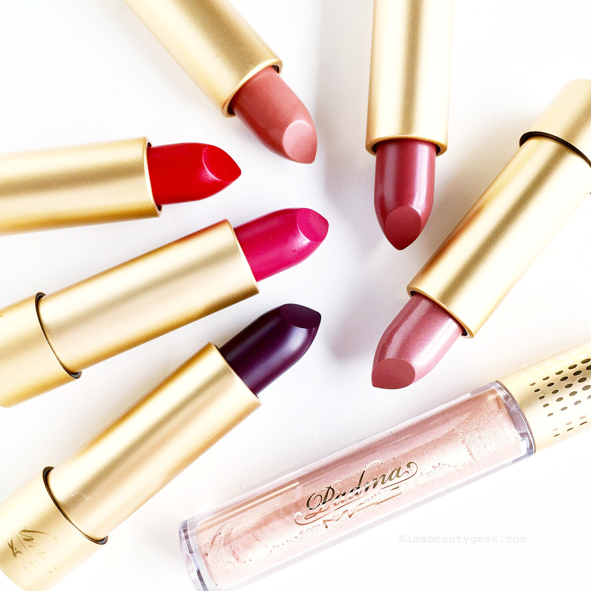 MAC Padma Lakshmi lipstick in Sumac, Mittai Pink, Blue Blood, Apricot Gold, Sunset Rose, Nude Fudge and Creamsheen Glass in Nefertiti