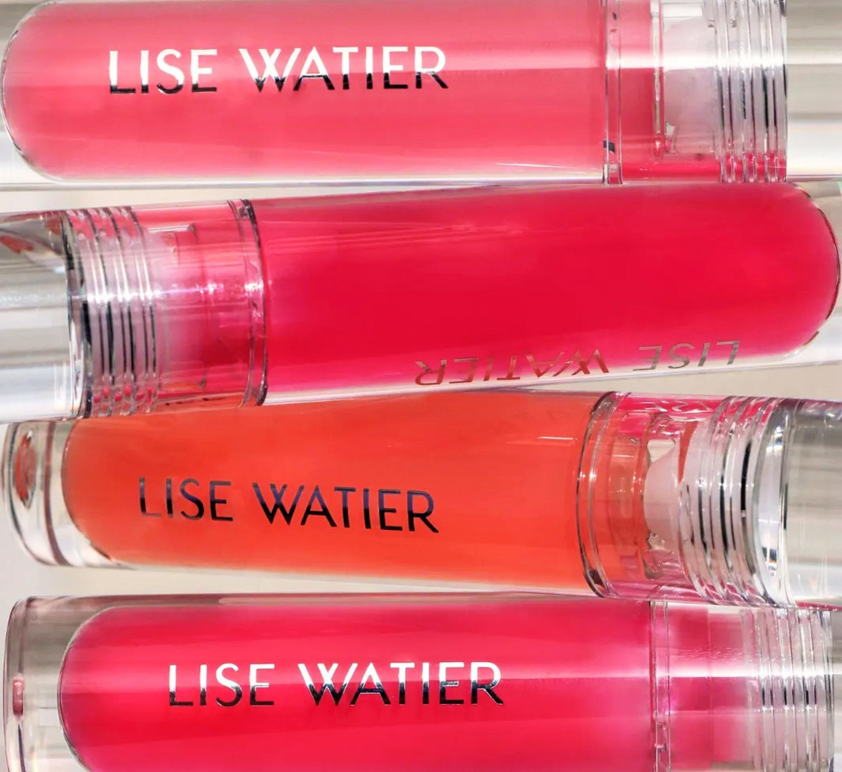 Watier Love My Lips Caring Lip Oil in Framboise, Rosehip (LE), Cantaloup, and Rosehip again (photo: Watier)